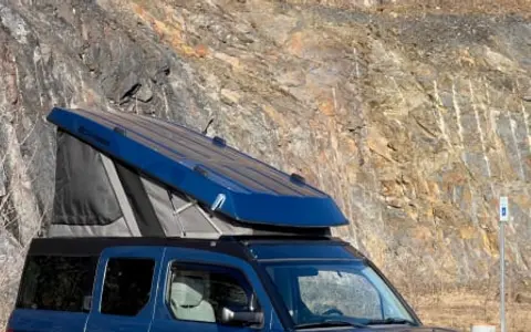 The ECamper: A Mini-Glamping Blue Boxcar for Alaskan Adventure.