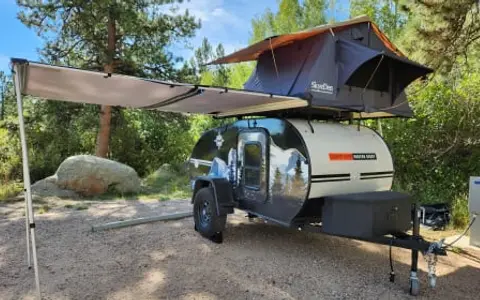 UNDER WYOMING STARS CAMPING LLC
