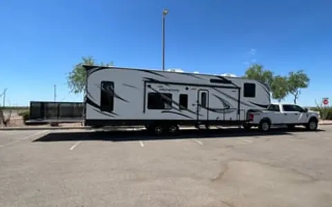 2020 Genesis 5th Wheel Toyhauler with deck patio