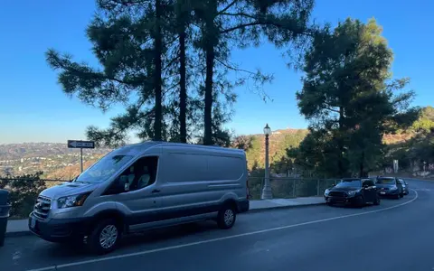 All-Electric 2023 Ford Camper van with Wifi, Office & Comforts!