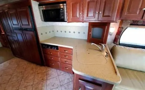 Debbie 5 - 2011 Winnebago Adventurer 35P