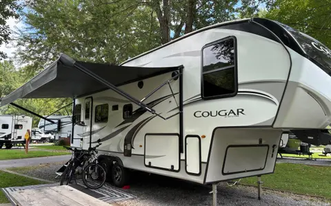 White Squirrel Keystone Cougar 24RDS Fifth Wheel