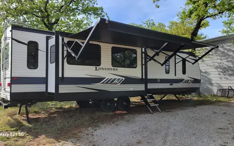 Dream RV, large rear living with TV.