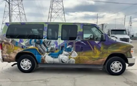 2009 Ford Econoline E150 - Excalibur