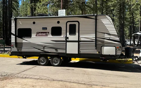Coleman Lantern 202RDWE Travel Trailer  named “TOWBIE”