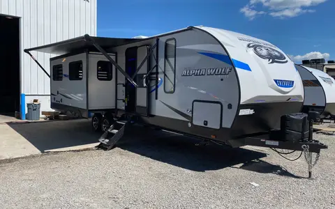 Matt and Shannon Forest River Alpha Wolf 26RL-L Travel Trailer