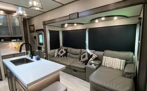 2021 Grand Design Solitude with HUGE bunkroom and half bath
