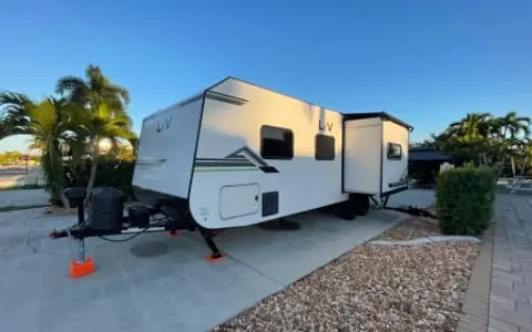 2026 light weight towing LIV with fireplace, outdoor kitchen & huge awning