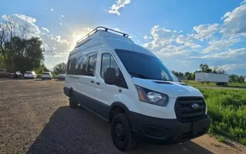 Custom Ford Transit- Pop Top bedroom, full bathroom & fridge!