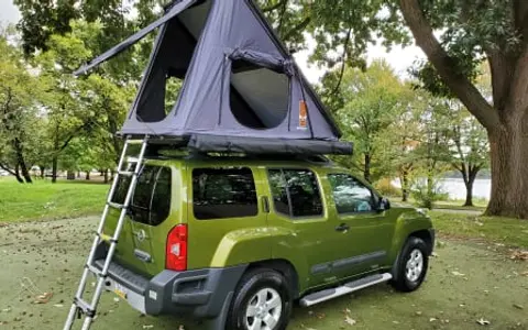 2012 Nissan Xterra with Roof Top Tent (200 miles/day free)