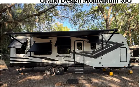 Moira's Mansion 2022 Grand Design Momentum Toy Hauler