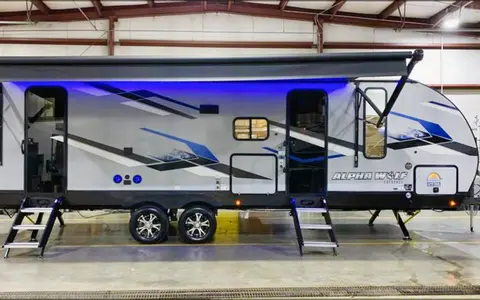 The Berger family Forest River Alpha wolf Travel Trailer